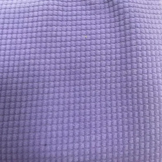 Tissu en velours côtelé polyester bande épaisse velours poupée jouet jette drap de lit oreiller textile à la maison canapé tissu stock d'usine.