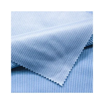 Tissu en velours côtelé bleu glacier 100% polyester pour pantalons décontractés